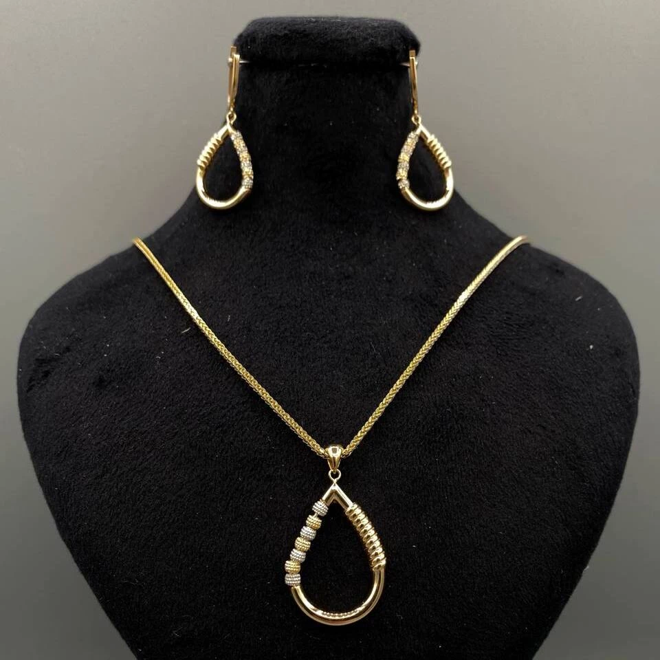 نیم ست طلا 18 عیار زنانه ترکیب گوی سفید و طلایی شامل آویز و گوشواره لاوندر کد 534-3.36 نیم ست طلا 18 عیار زنانه ترکیب گوی سفید و طلایی شامل آویز و گوشواره لاوندر کد 534-3.36