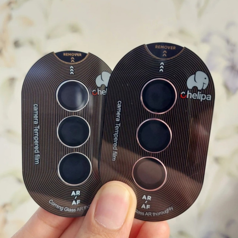 محافظ لنز دوربین شیشه ای اوجی مدل chelipa titanium مناسب برای گوشی موبایل سامسونگ Galaxy A55 محافظ لنز دوربین شیشه ای اوجی مدل chelipa titanium مناسب برای گوشی موبایل سامسونگ Galaxy A55