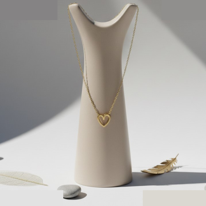 گردنبند طلا 18 عیار زنانه با زنجیر حلقهای (فلامینگو) گالری قو طلایی مدل قلب تو خالی اورانوس گردنبند طلا 18 عیار زنانه با زنجیر حلقهای (فلامینگو) گالری قو طلایی مدل قلب تو خالی اورانوس