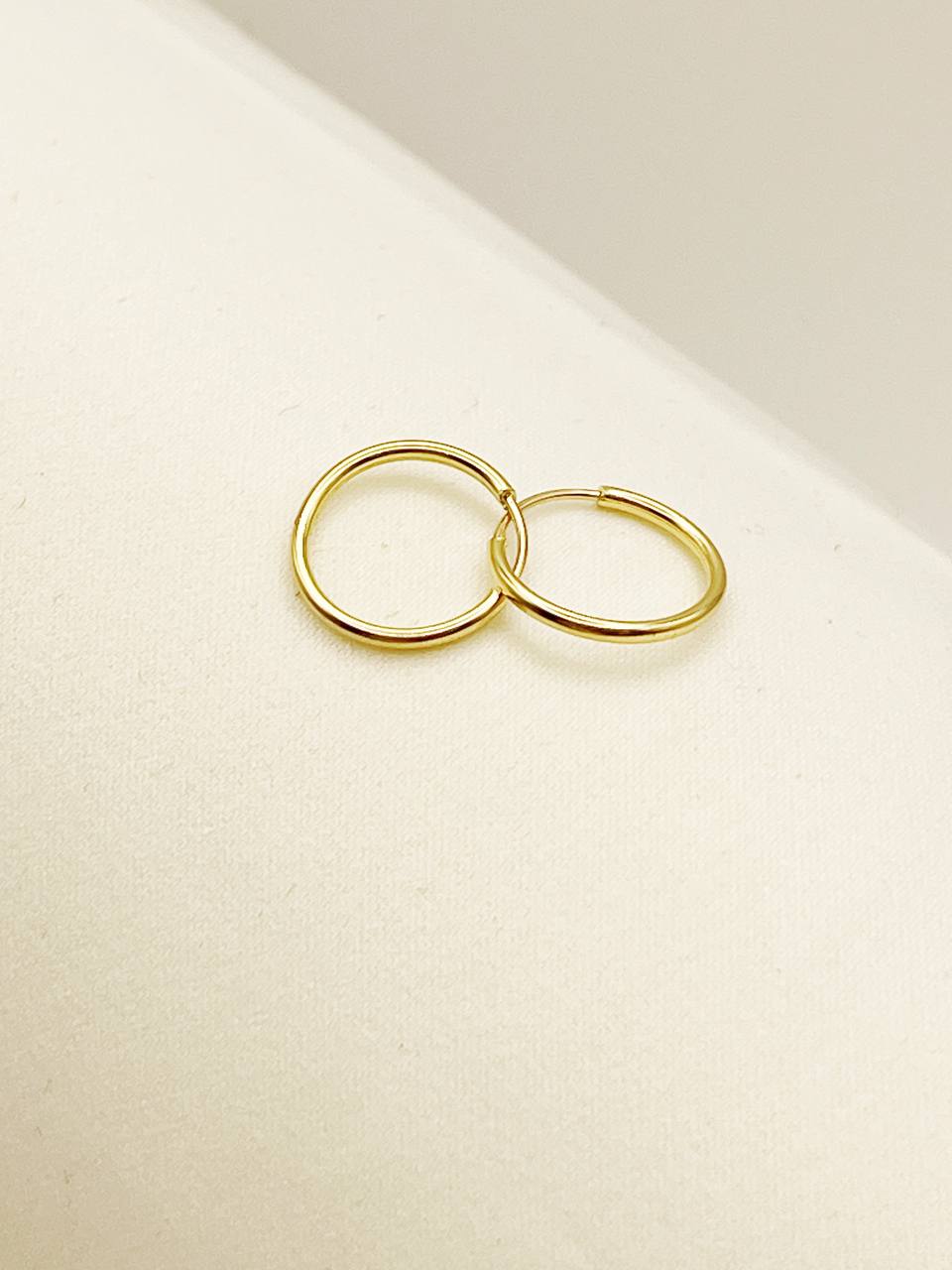 گوشواره حلقه ای کوچک قطر 1.6 طلا 18 عیار گوشواره حلقه ای کوچک قطر 1.6 طلا 18 عیار