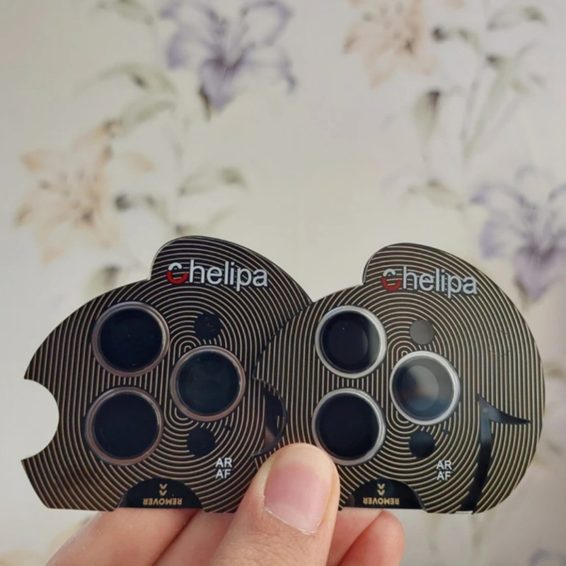 محافظ لنز دوربین شیشه ای اوجی مدل chelipa titanium مناسب برای گوشی موبایل اپل iPhone 16 Pro Max محافظ لنز دوربین شیشه ای اوجی مدل chelipa titanium مناسب برای گوشی موبایل اپل iPhone 16 Pro Max