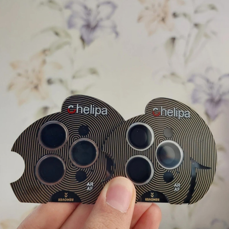 محافظ لنز دوربین شیشه ای اوجی مدل chelipa titanium مناسب برای گوشی موبایل اپل iPhone 16 Pro محافظ لنز دوربین شیشه ای اوجی مدل chelipa titanium مناسب برای گوشی موبایل اپل iPhone 16 Pro