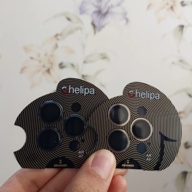 محافظ لنز دوربین شیشه ای اوجی مدل chelipa titanium مناسب برای گوشی موبایل اپل iPhone 13 Pro Max محافظ لنز دوربین شیشه ای اوجی مدل chelipa titanium مناسب برای گوشی موبایل اپل iPhone 13 Pro Max