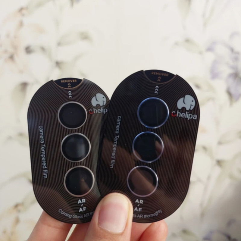 محافظ لنز دوربین شیشه ای اوجی مدل chelipa titanium مناسب برای گوشی موبایل سامسونگ Galaxy S24 FE محافظ لنز دوربین شیشه ای اوجی مدل chelipa titanium مناسب برای گوشی موبایل سامسونگ Galaxy S24 FE