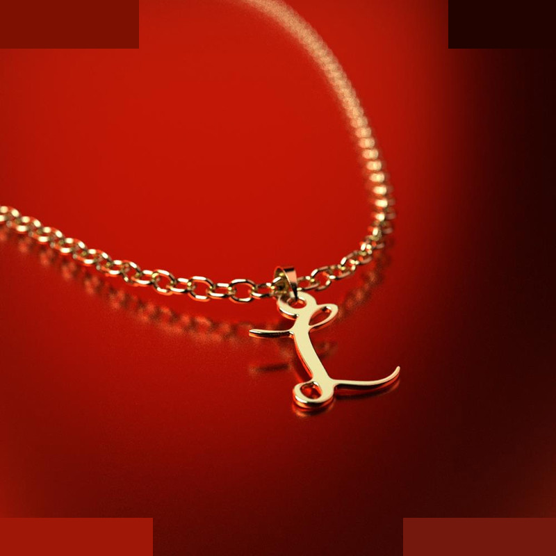 نیم ست طلا 18 عیار زنانه مدوپد مدل حرف L کد NA12336