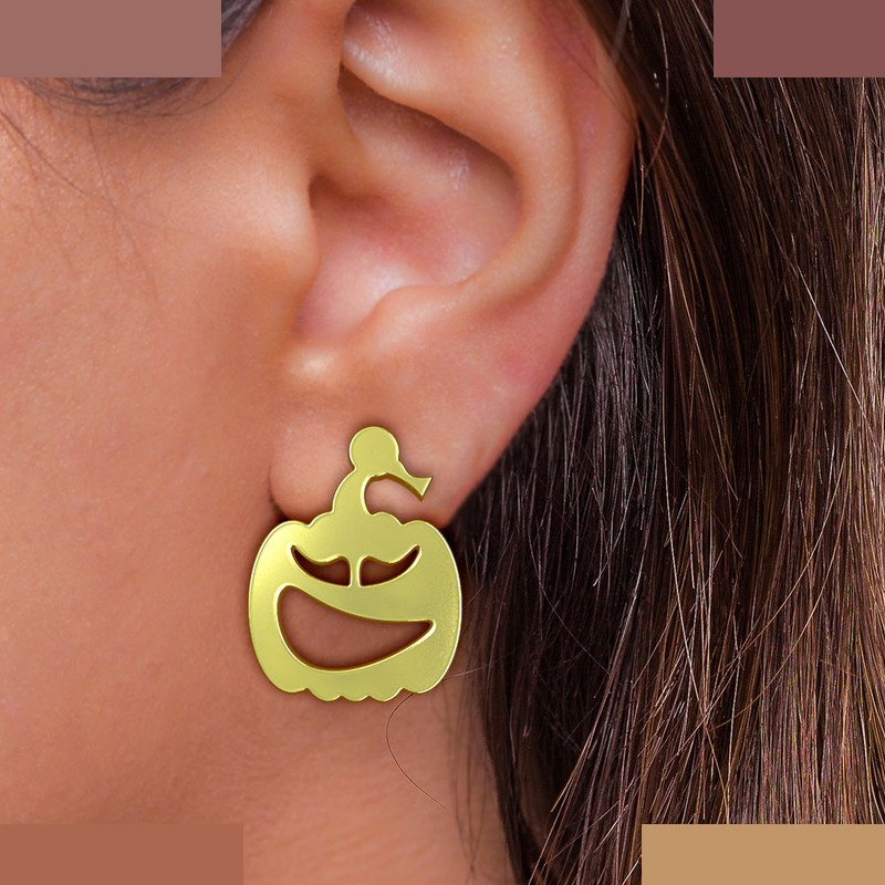 گوشواره طلا 18 عیار زنانه مدوپد مدل کدو هالووین کد GA1-10401 گوشواره طلا 18 عیار زنانه مدوپد مدل کدو هالووین کد GA1-10401