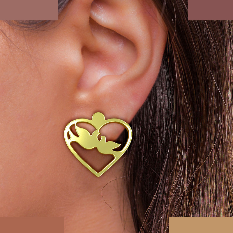 گوشواره طلا 18 عیار زنانه مدوپد مدل قلب و پرنده کد GA1-11048 گوشواره طلا 18 عیار زنانه مدوپد مدل قلب و پرنده کد GA1-11048