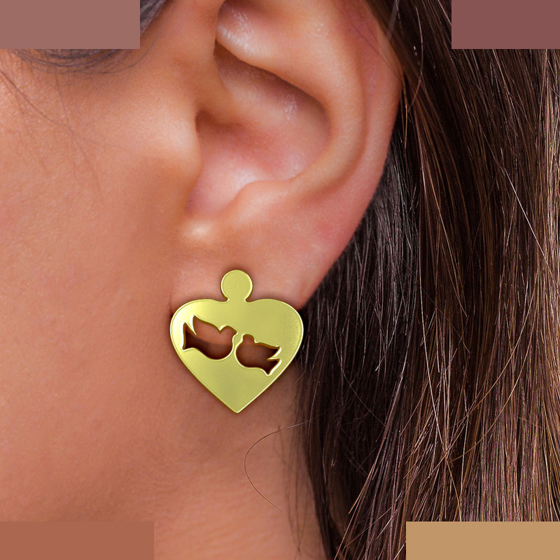 گوشواره طلا 18 عیار زنانه مدوپد مدل پرنده و قلب کد GA1-11718 گوشواره طلا 18 عیار زنانه مدوپد مدل پرنده و قلب کد GA1-11718