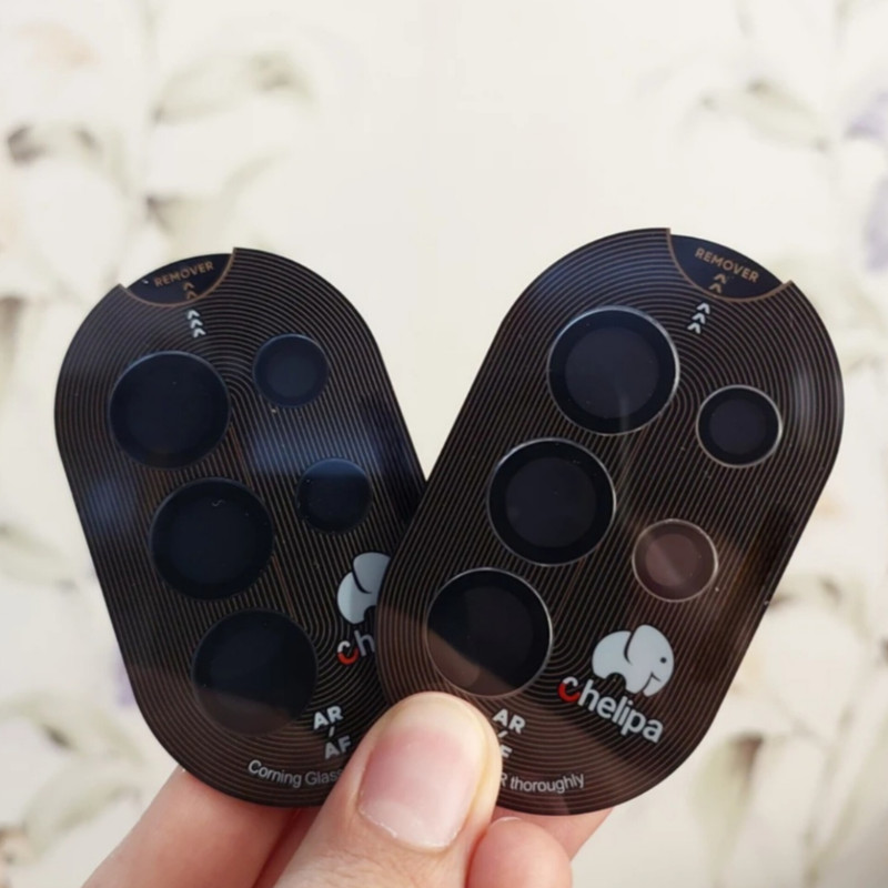 محافظ لنز دوربین شیشه ای اوجی مدل chelipa titanium مناسب برای گوشی موبایل سامسونگ Galaxy S24 Ultra محافظ لنز دوربین شیشه ای اوجی مدل chelipa titanium مناسب برای گوشی موبایل سامسونگ Galaxy S24 Ultra