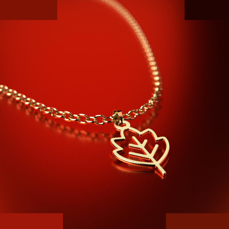 نیم ست طلا 18 عیار زنانه مدوپد مدل برگ کد NA15739 نیم ست طلا 18 عیار زنانه مدوپد مدل برگ کد NA15739