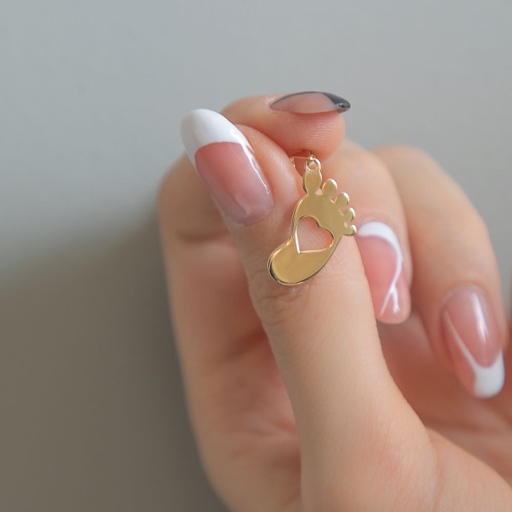 پلاک طلا زنانه طلا 18عیار طرح ردپا پلاک طلا زنانه طلا 18عیار طرح ردپا