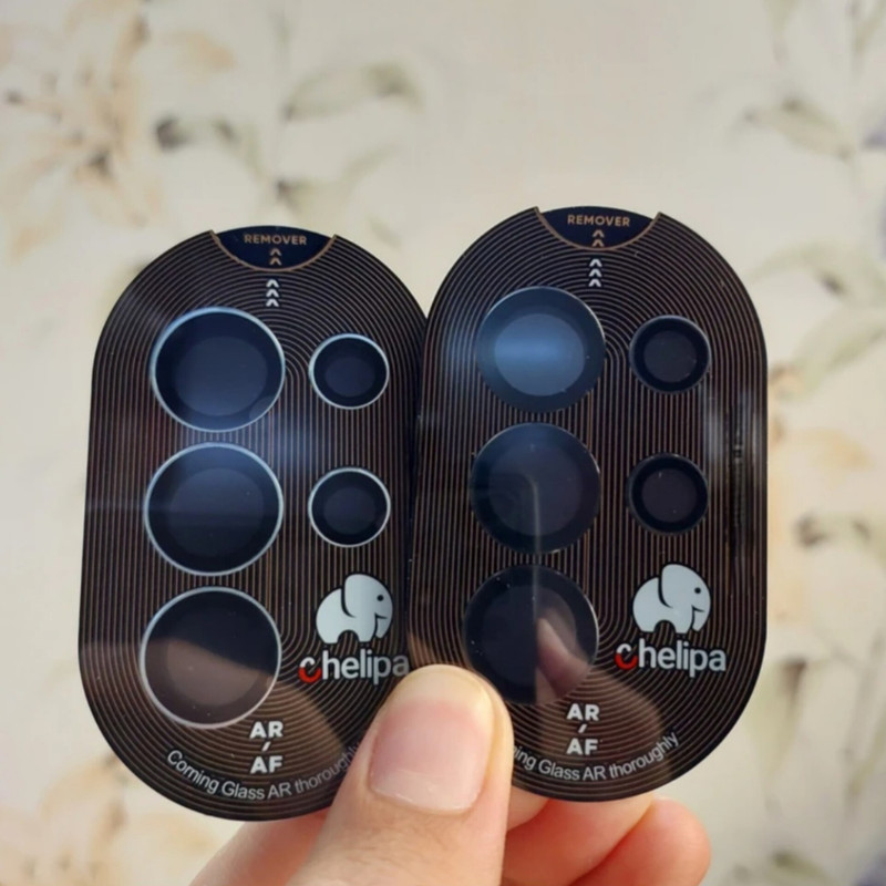 محافظ لنز دوربین شیشه ای اوجی مدل chelipa titanium مناسب برای گوشی موبایل سامسونگ Galaxy S25 Ultra محافظ لنز دوربین شیشه ای اوجی مدل chelipa titanium مناسب برای گوشی موبایل سامسونگ Galaxy S25 Ultra