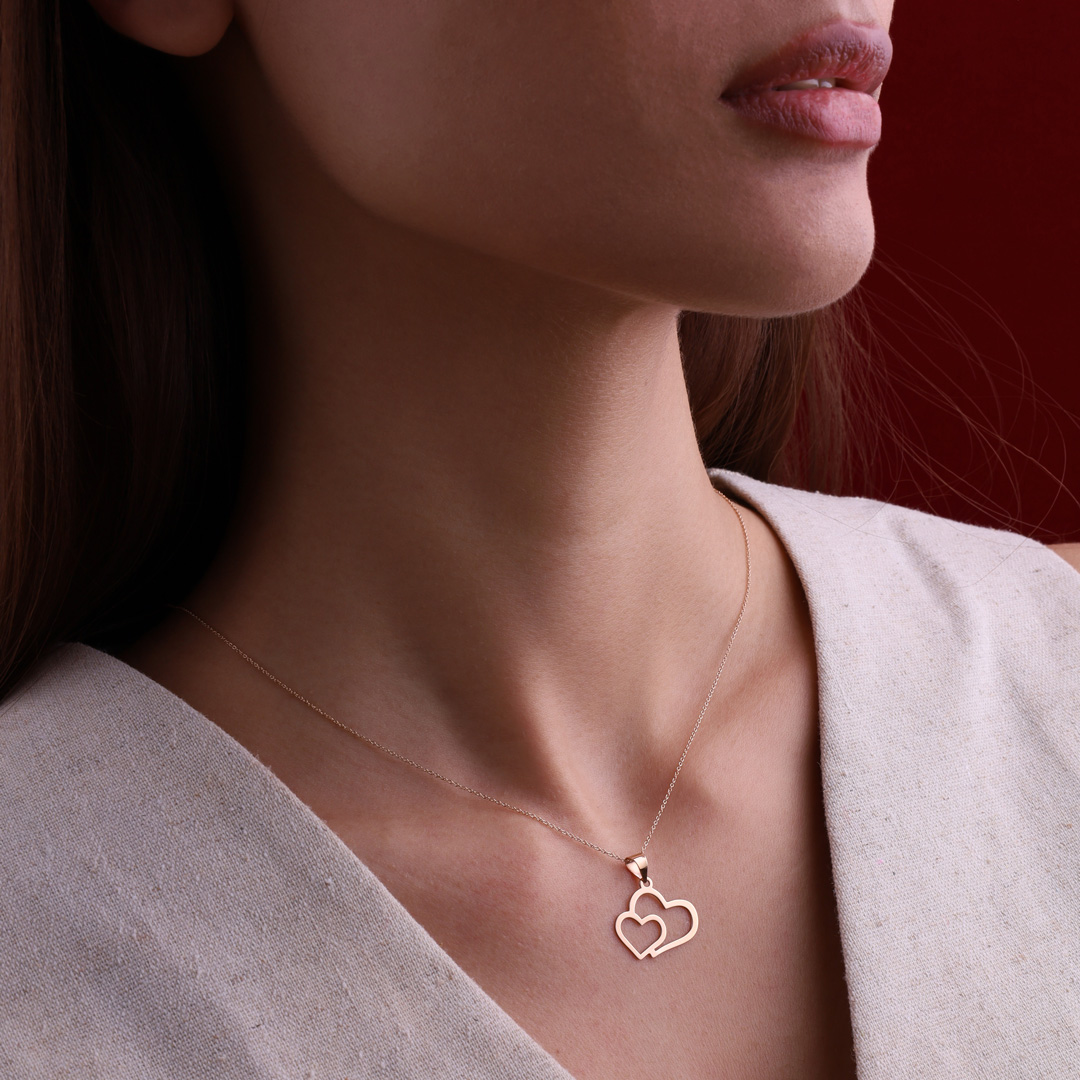 پلاک طلا 18عیار زنانه طرح دو قلب پلاک طلا 18عیار زنانه طرح دو قلب